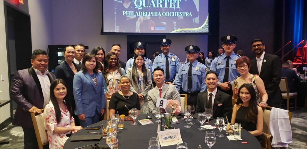 Philip Singh with community members and officers at AAPI Heritage event featuring the Philadelphia Orchestra Quartet