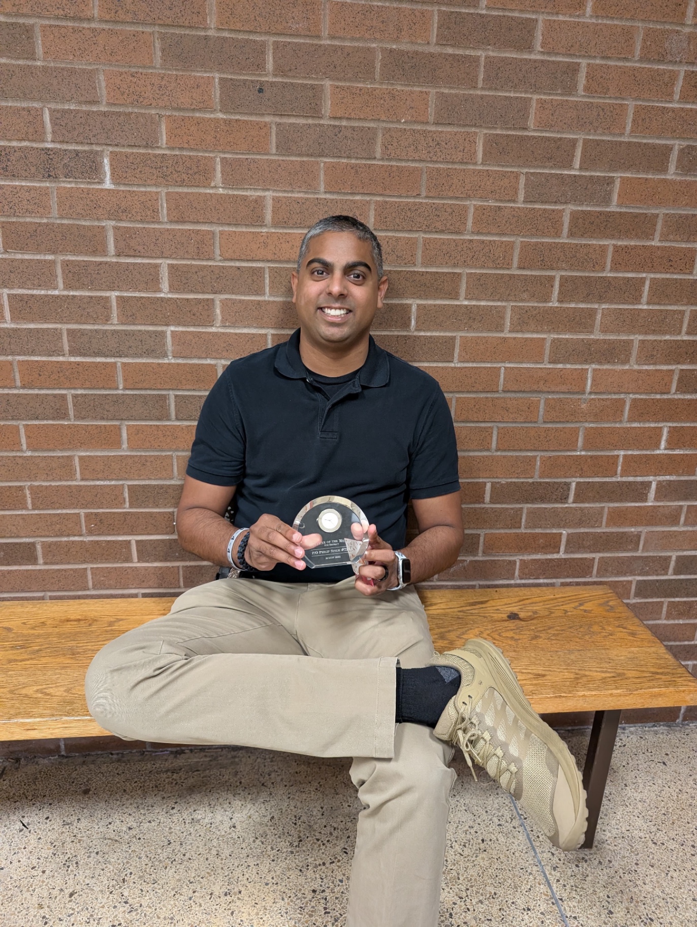 Philip Singh receiving Officer of Distinction award
